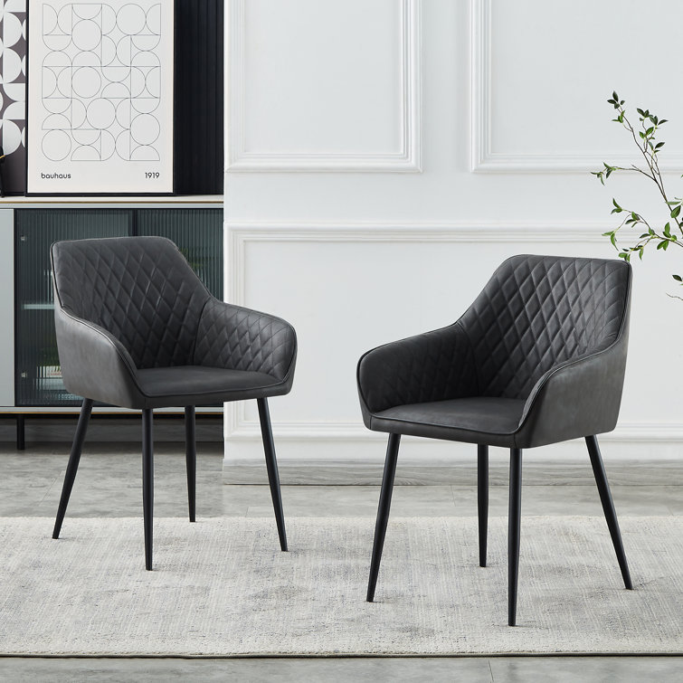 Seaham Upholstered Faux Leather Dining Chairs with Arm